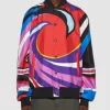 Will Smith Pretty Girls multicolor satin bomber jacket with a glossy finish, rib‑knit striped collar, cuffs and hem, snap‑button front closure, and oversized “Pretty Girls” lettering graphic spanning the chest and back