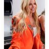 Alexia Echevarria from The Real Housewives of Miami wearing a vibrant orange blazer featuring a tailored silhouette, notched lapels, single-button closure, and a sleek, polished cut.