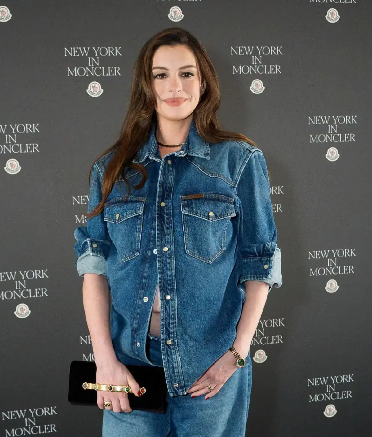 Anne Hathaway Fifth Avenue Flagship Opening Jacket showcasing a refined silhouette with polished outerwear detailing.